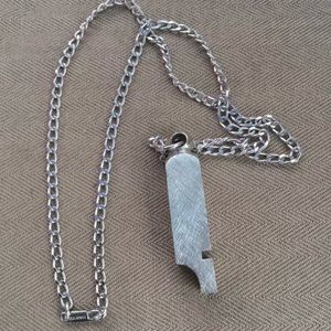 Silver toned vintage whistle necklace